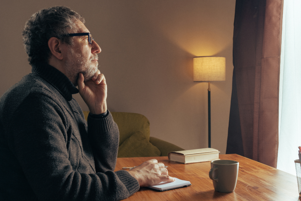 Man sitting with Emotional Intelligence and Midlife Clarity