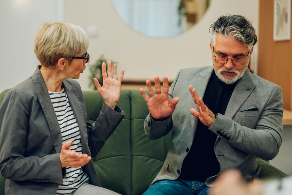 Coach and client in grounded one-on-one conversation reading triggers together