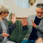 Coach and client in grounded one-on-one conversation reading triggers together